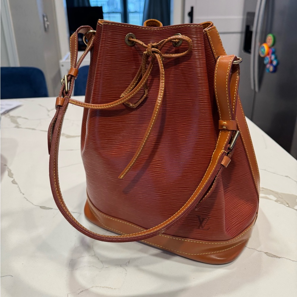 Louis Vuitton Noe Drawstring Bag Epi Zipang Gold